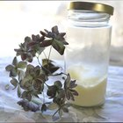 Mother makes massage for happy baby