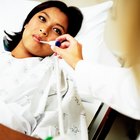 pregnant woman in nightdress with thermometer