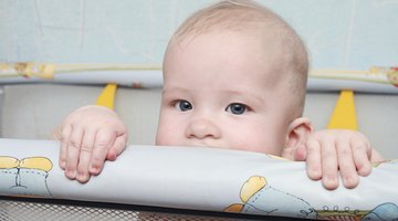 Girl Reading a Book on a Potty Chair