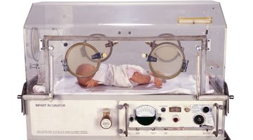 Infant sleeping on a bed