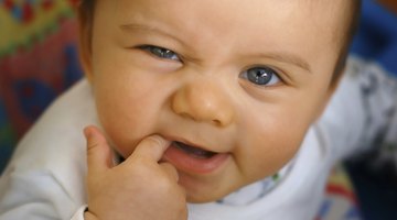 Baby holding a toy