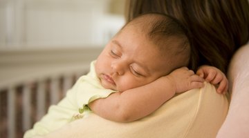 Closeup of woman holding baby