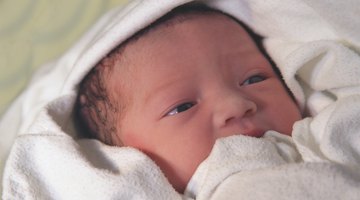 Manual breast pump and milk at background