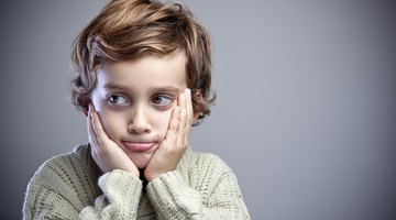 Boy Sitting at the Kitchen Table