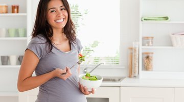 Pregnant woman with orange juice