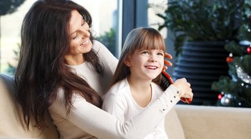Mother holding daughter