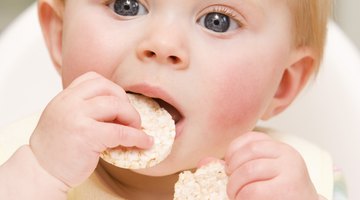 Mother Spoon-Feeding Her Infant