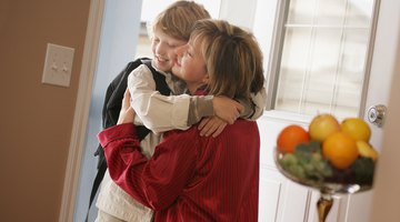 Mature woman comforting  daughter with baby a